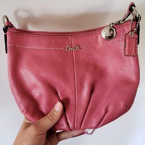 small pink leather Coach crossbody purse